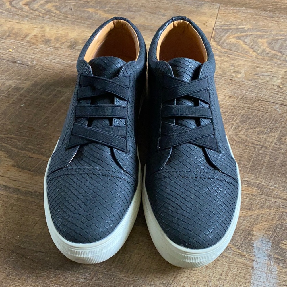 Black platform slip on sneakers